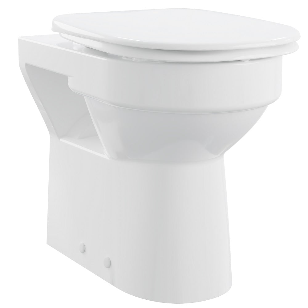 White toilet bowl with closed lid on a white background