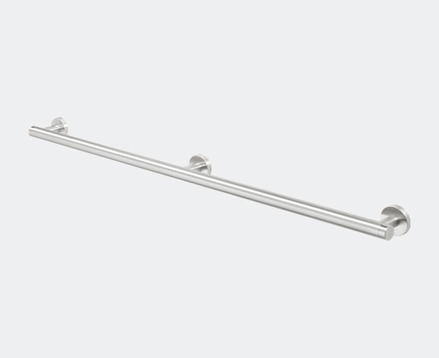Metallic towel bar on a light gray background