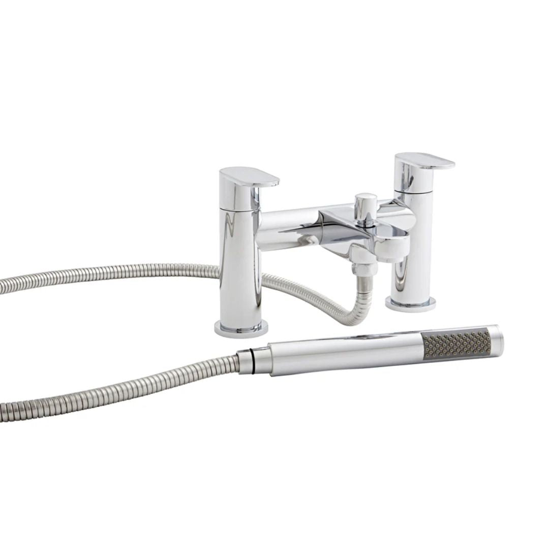 Chrome bath filler and shower attachment on a whilte background
