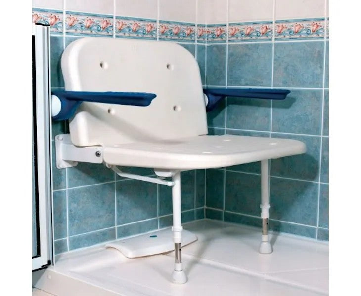 Wall-mounted shower seat with blue armrests in a tiled bathroom.