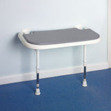 grey shower seat in place