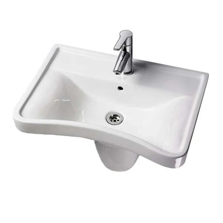 A curved white sink against a white background