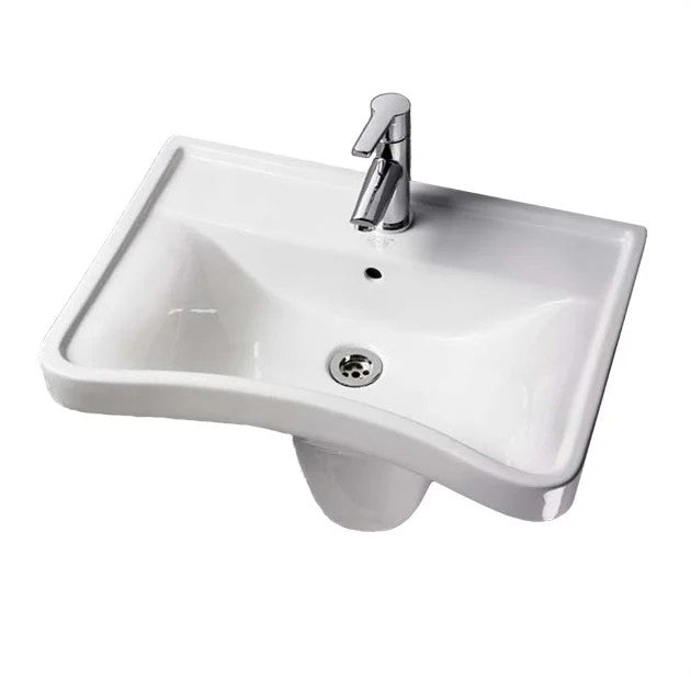 A curved white sink against a white background
