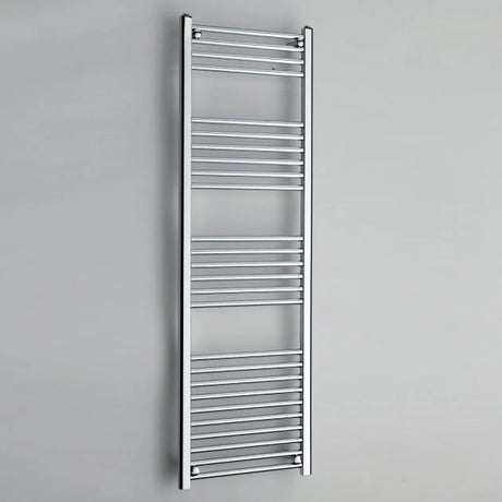 Chrome towel radiator on a gray background