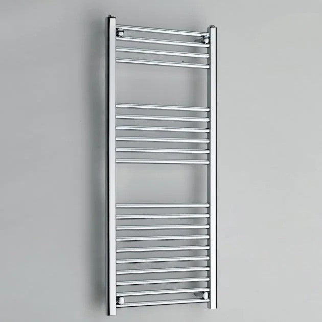 Chrome towel radiator on a gray background