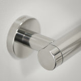 Chrome towel bar on a white wall