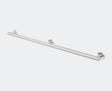 Metallic towel bar on a light gray background