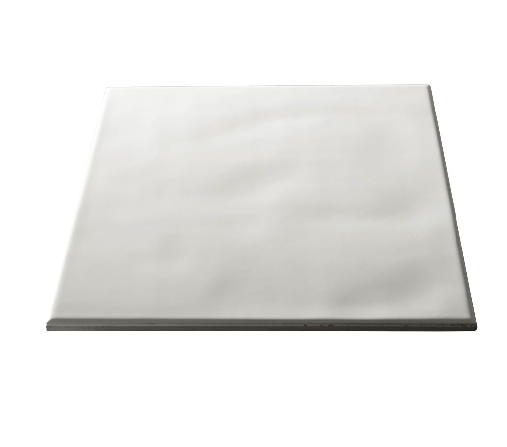 White tile angled on a white background