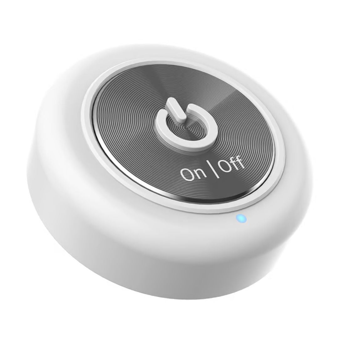 A round white electronic device with a metallic gray top panel featuring a power symbol and the text 'On | Off', shown on a plain white background.