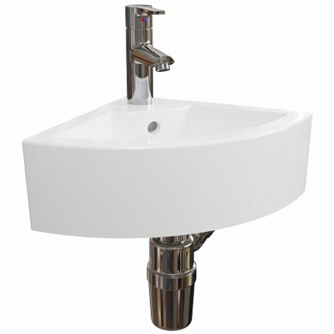 A white corner wall-mounted sink with a polished chrome faucet and drain pipe, shown against a plain white background.