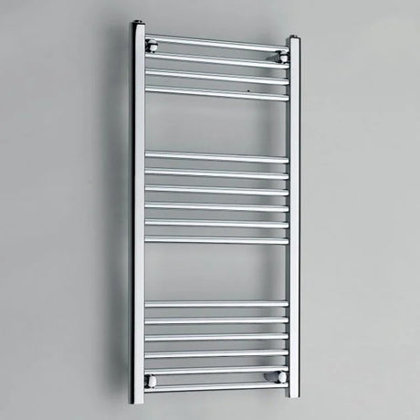 Chrome towel radiator on a gray background