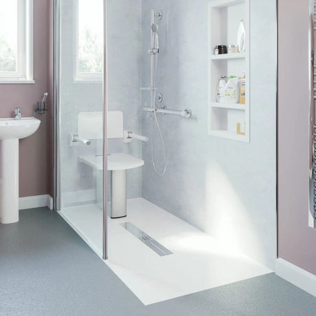Modern bathroom with a walk-in shower, sink, and shelves.