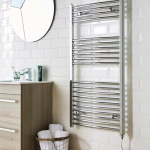 Bathroom with a towel radiator, sink, and mirror.