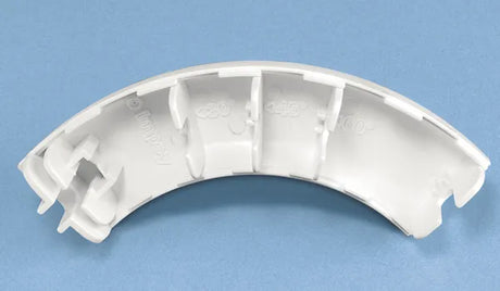 White plastic component on a blue background