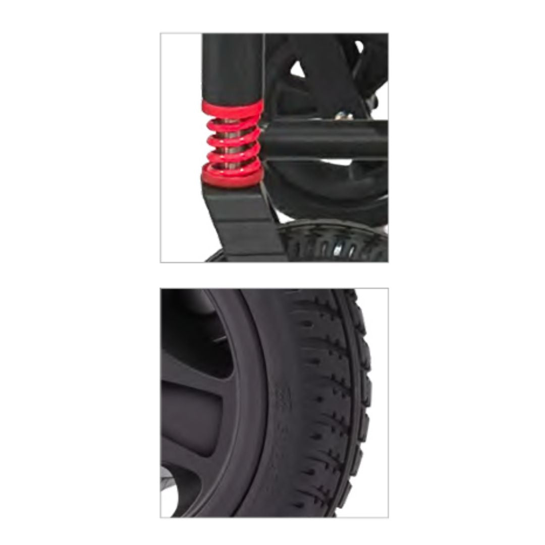 Close-up of a black tire with red spring and black suspension components on a white background.