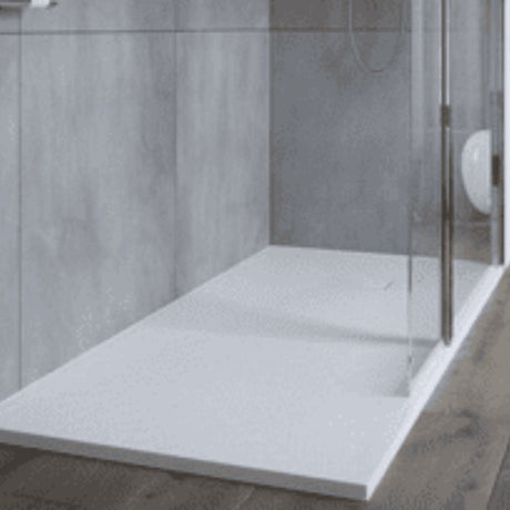 White shower tray in a modern bathroom setting