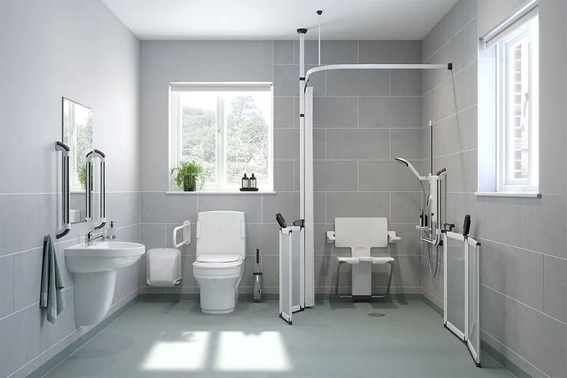 Wetroom with accessibility features including a toilet, sink, and shower facilities.