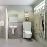 A modern bathroom interior featuring a wall-mounted rise and fall bidet toilet with side grab handles, a white pedestal sink, a shower curtain, and a heated towel rail against sage green walls.