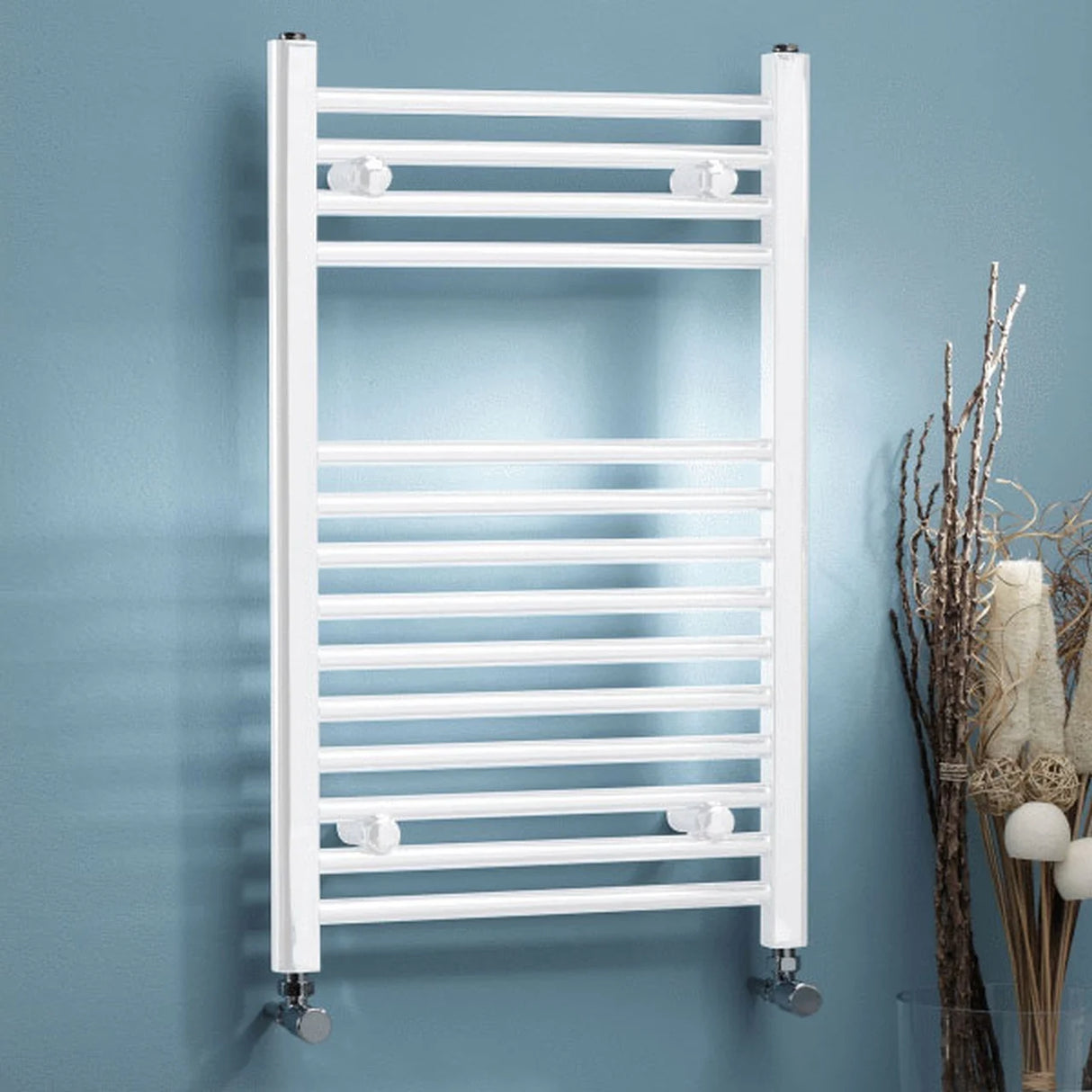 small white towel rail on blue background