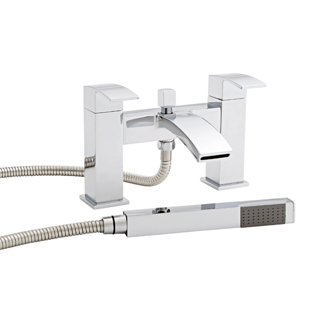 chrome bath tap and shower head