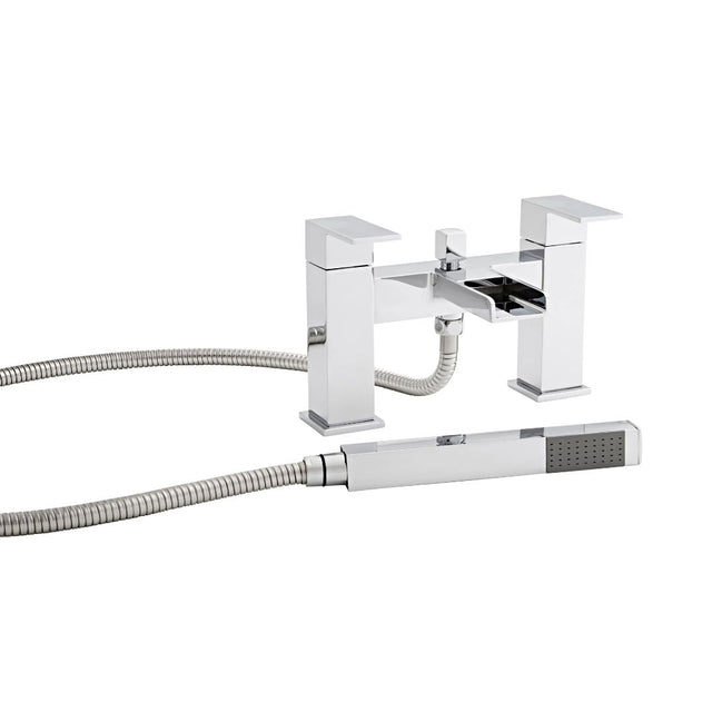 Chrome bathtub faucet with handheld shower head on a white background