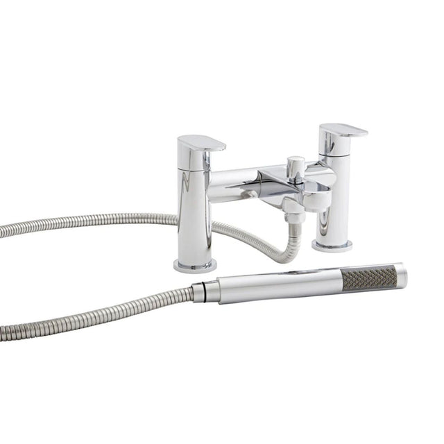 Chrome bath filler and shower attachment on a whilte background 