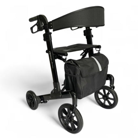 A black four-wheel rolling walker with a padded backrest, seat, and a matching black storage bag featuring a reflective silver stripe, shown on a white background.