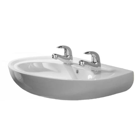 A white ceramic bathroom sink with a semi-oval basin and two polished chrome faucets, shown against a plain white background.