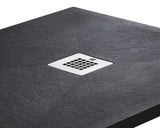 Gray shower tray with a central chrome drain cover on a white background