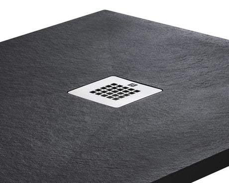 Gray shower tray with a central chrome drain cover on a white background