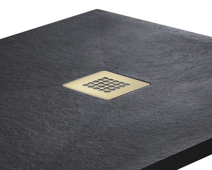 A square dark charcoal slate shower floor with a square inset brass drain grid, shown on a clean white background.