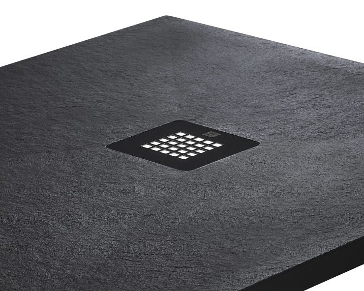 Black rectangular shower tray with a central graphite drain cover on a white background