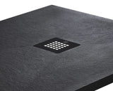 Black rectangular shower tray with a central graphite drain cover on a white background