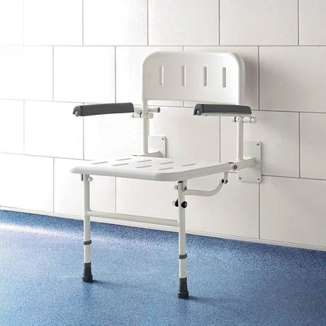 White shower seat with arms and back attached to a wall