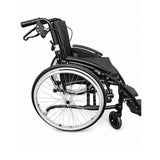 side view of black wheelchair on white background